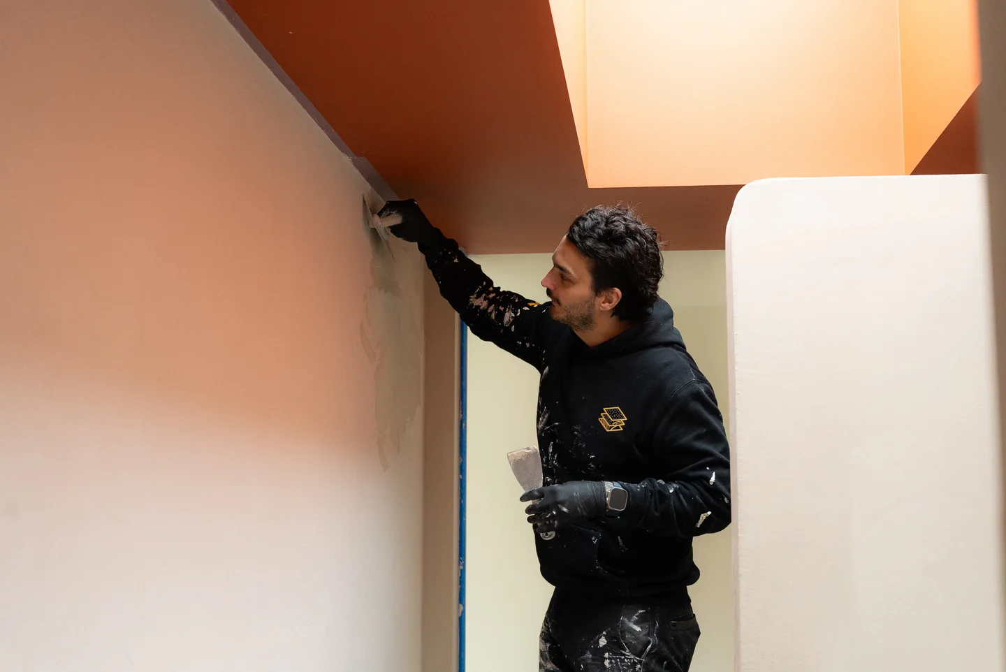 Wall application beneath a skylight
